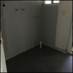 Wet Area tiles being laid